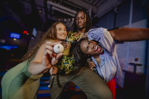 Group of Puttshack Guests Posing for Camera